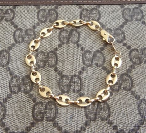 gucci alternating gold and silver link bracelet|most expensive gold Gucci bracelet.